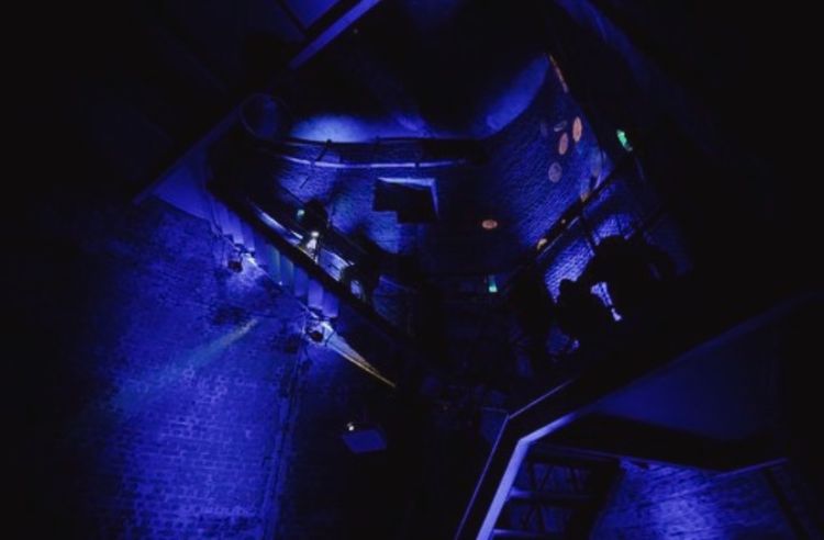 Illuminatd stairwell down to the bascule chambers at Tower Bridge